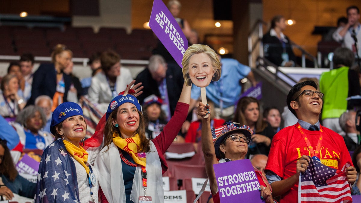 Delegates show their support for Hillary Clinton during day three of the Democratic National Convention. (Emily Cohen for NewsWorks)