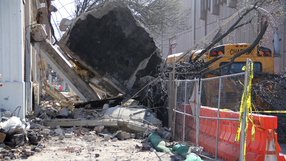 collapse The wall of a building being demolished collapsed onto a school bus at Race and 5th Street. No one was injured. (Emma Lee/WHYY)