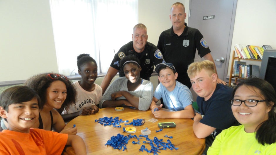 Collingswood students are shown working with police officers on a community relations project in 2015. (Matt Skoufalos/NJ Pen)