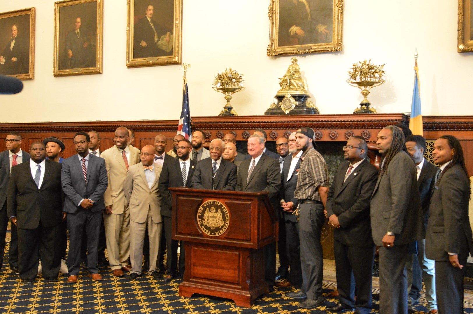 Members of the new Mayor's Commission on African-American Males gather Tuesday at Philadelphia City Hall. (Tom MacDonald/WHYY)