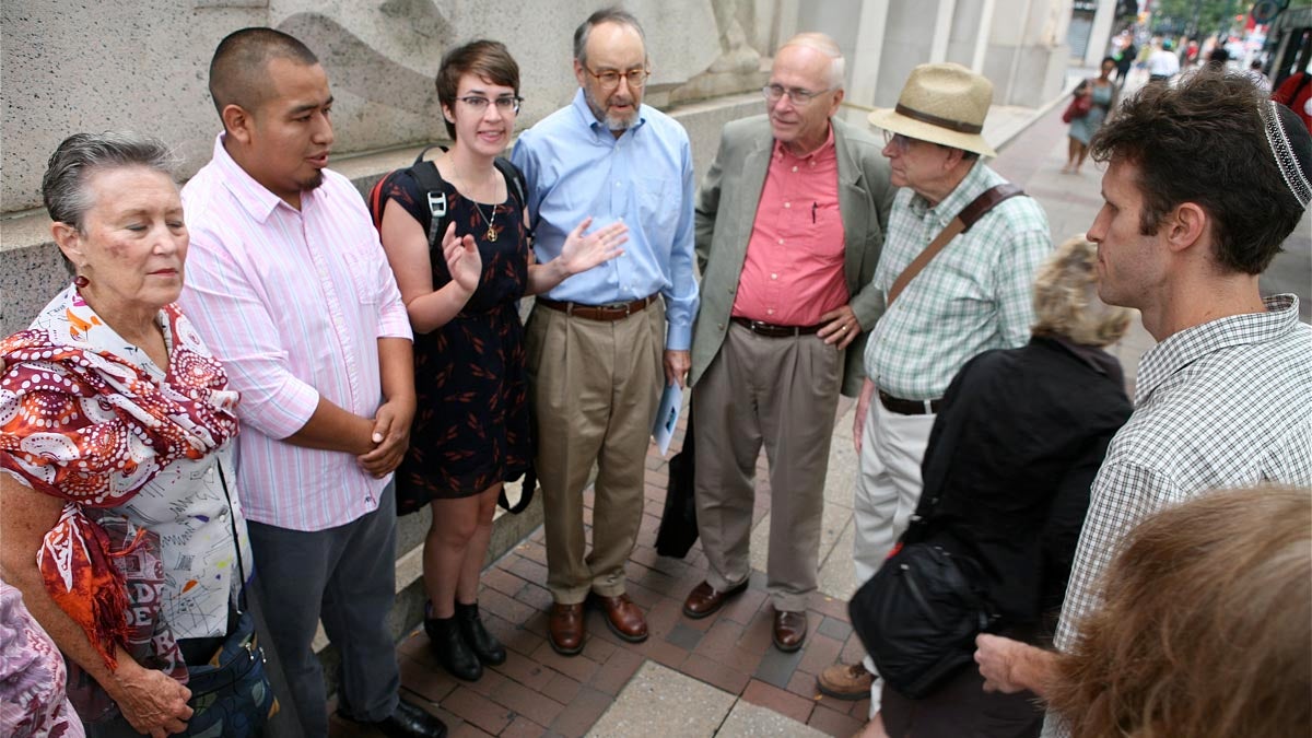 Members of Mishkan Shalom Synagogue and other congregations pray with Pedro Avila before his deportation hearing. (Photo credit: Harvey Finkle)