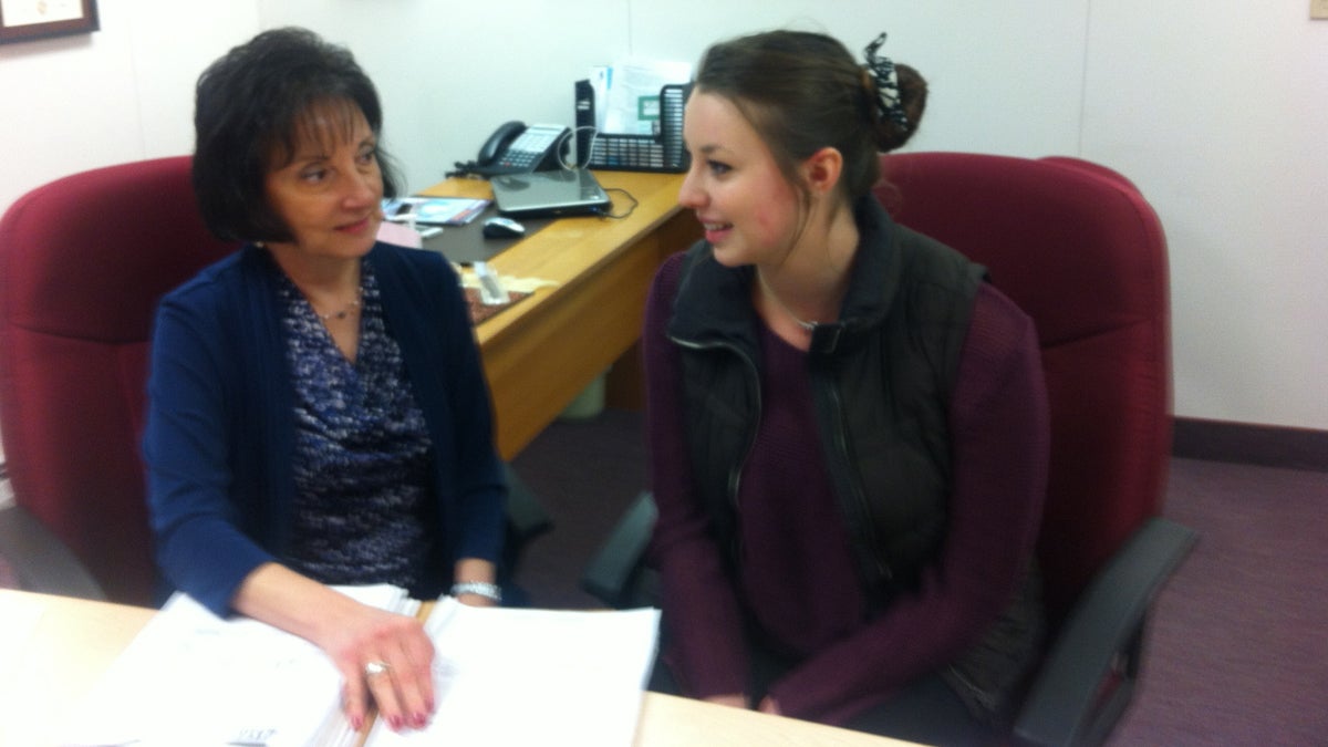 Rosemarie Scolaro Moser reviews cognitive testing with former concussion patient Andrea Cooper (Maiken Scott/for The Pulse)