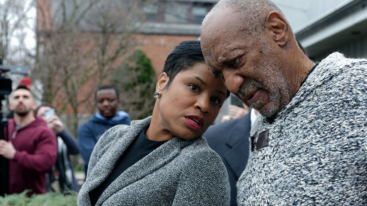  Bill Cosby leaves court escorted by Monique Pressley, one of his lawyers. (Bastiaan Slabbers/for NewsWorks) 