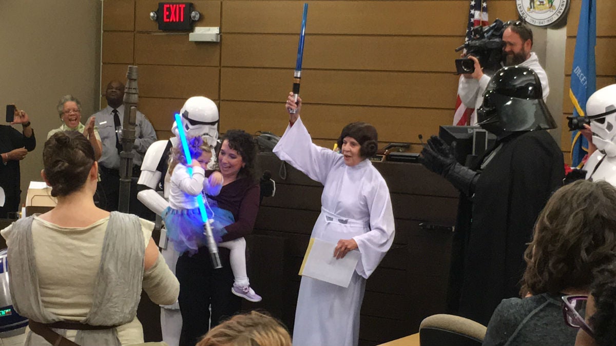 Delaware Family Court Judge Barbara Crowell dressed as Princess Leia as part of a Star Wars-themed adoption ceremony  at the New Castle County Courthouse Friday afternoon. (Mark Eichmann/WHYY)