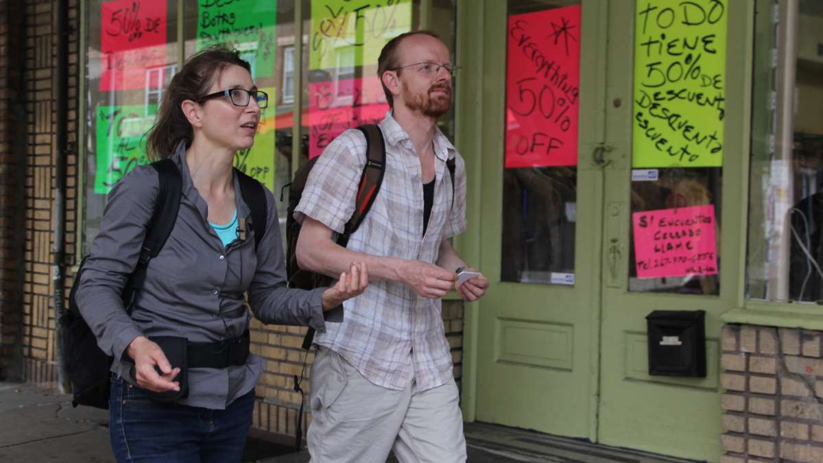  Esther Polak, with her partner Ivar van Bekkum, records her reactions to the Italian Market. The recordings will be the narration of a movie created in Google Earth. (Emma Lee/WHYY) 