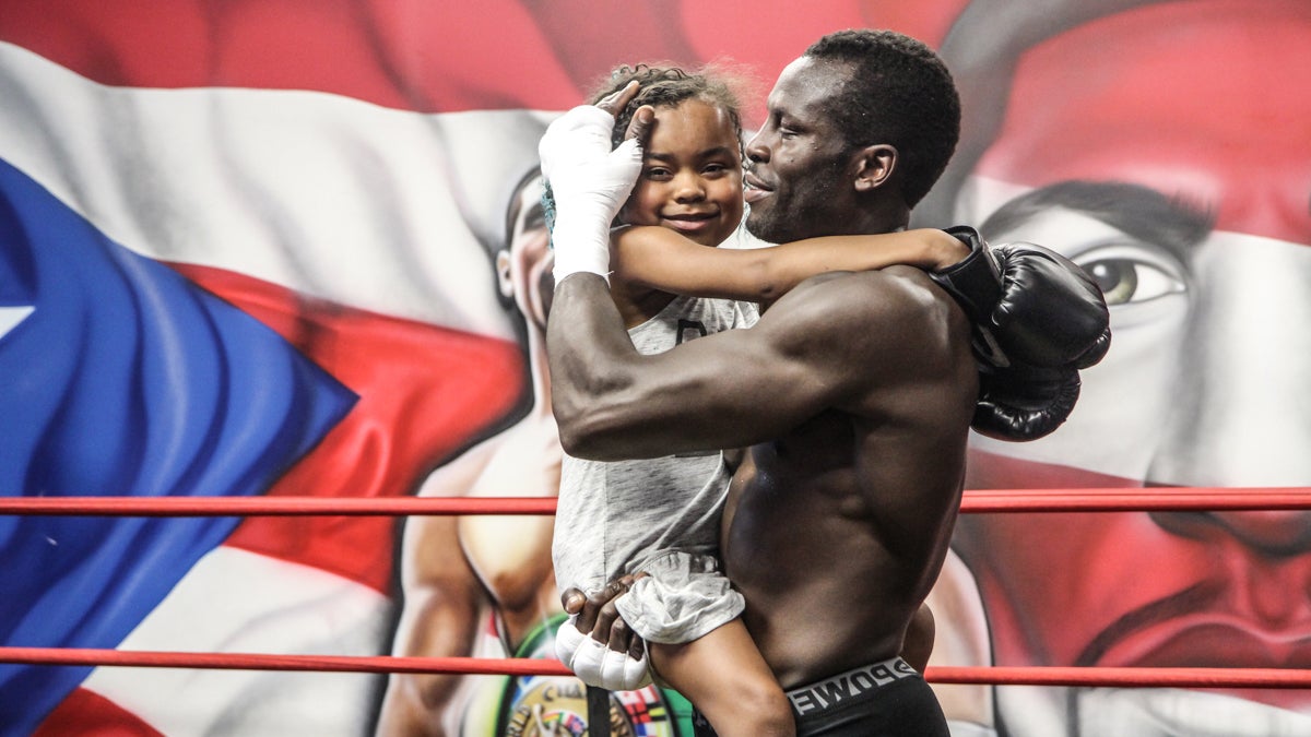 Philly boxer Steve Cunningham and his daughter Kennedy, 9, who received a heart transplant last December. (Kimberly Paynter/WHYY)
