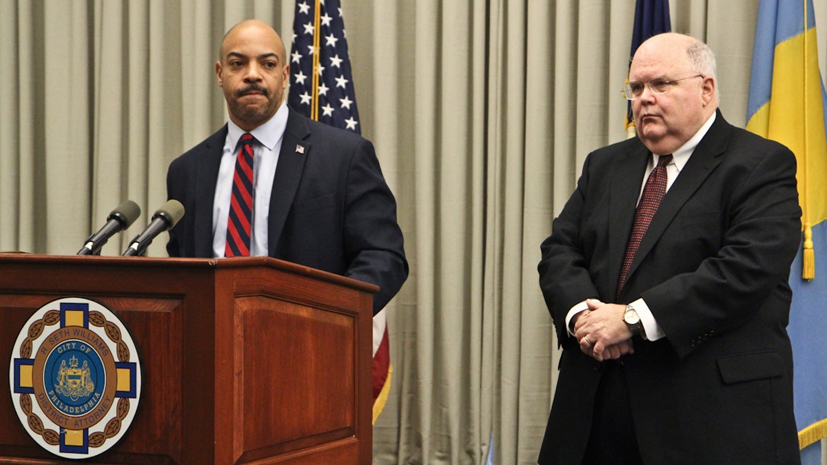  Philadelphia District Attorney Seth Williams, left, and Hugh Burns, chief of appeals with the district attorney's office, discuss their move to ask the Pennsylvania  appellate court to reconsider its decision overturning the conviction of Monsignor William Lynn on charges of child endangerment. (Kimberly Paynter/NewsWorks) 
