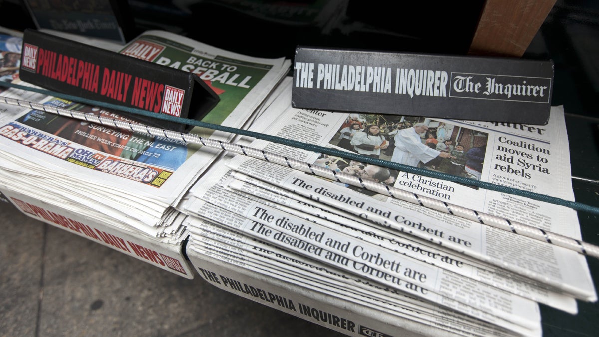  The Philadelphia Inquirer and Philadelphia Daily News newspapers sit on display at a newsstand in Philadelphia. (AP Photo/Matt Rourke, file) 