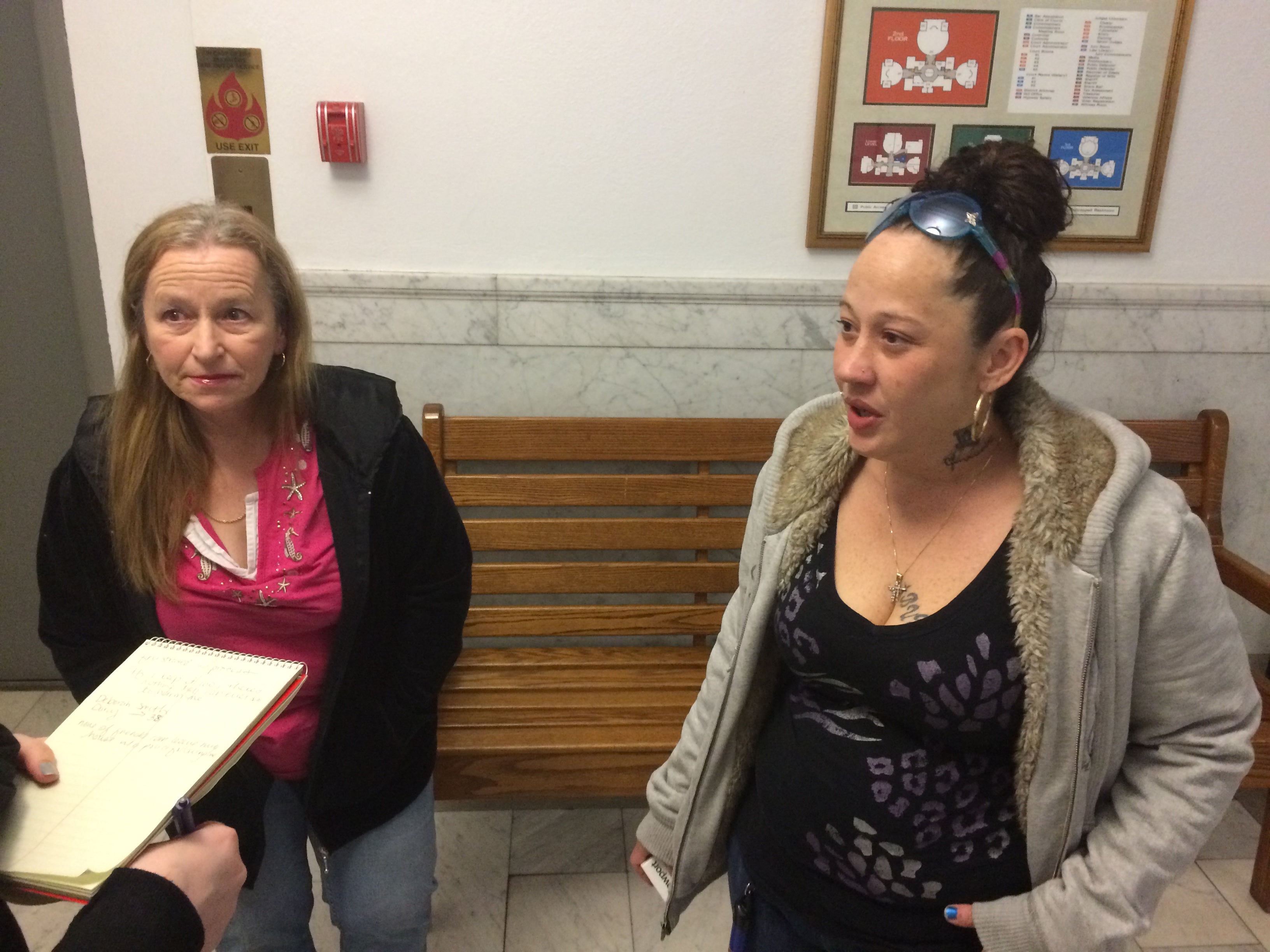 Deborah Smith and her daughter Darcy Smith talk to a reporter after a hearing Wednesday morning at the Cambria County Courthouse in Ebensburg. Darcy Smith is suing the borough of Gallitzin over an ordinance that fines landlords $1