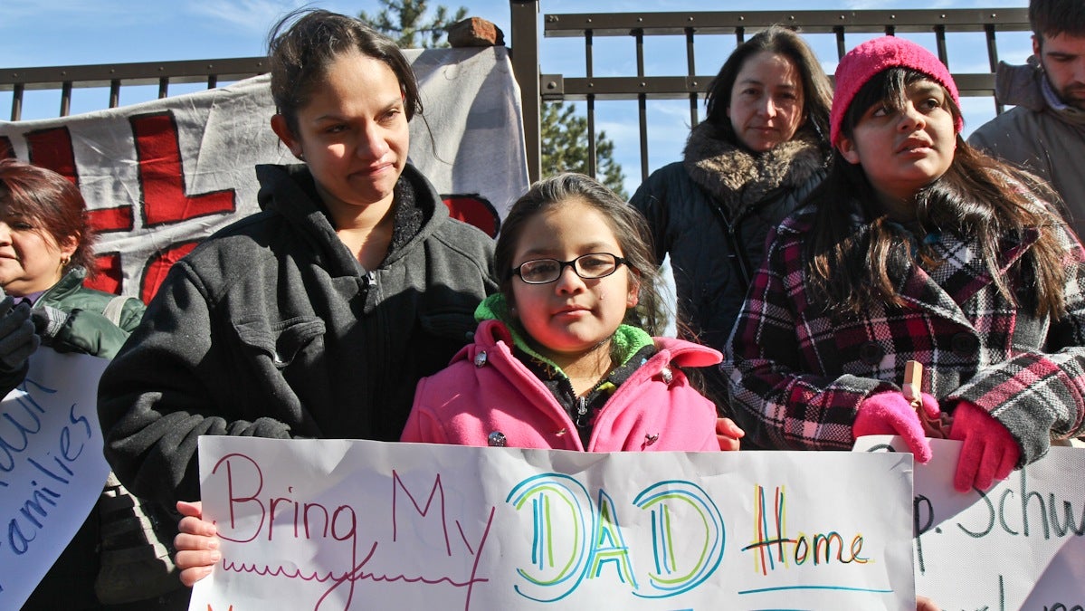  Pilar Molina and Caitlin Resendiz are the wife and daughter of Isreal Resendiz-Hernandez, a Norristown shop owner who was just released from custody.(Kimberly Paynter/WHYY) 