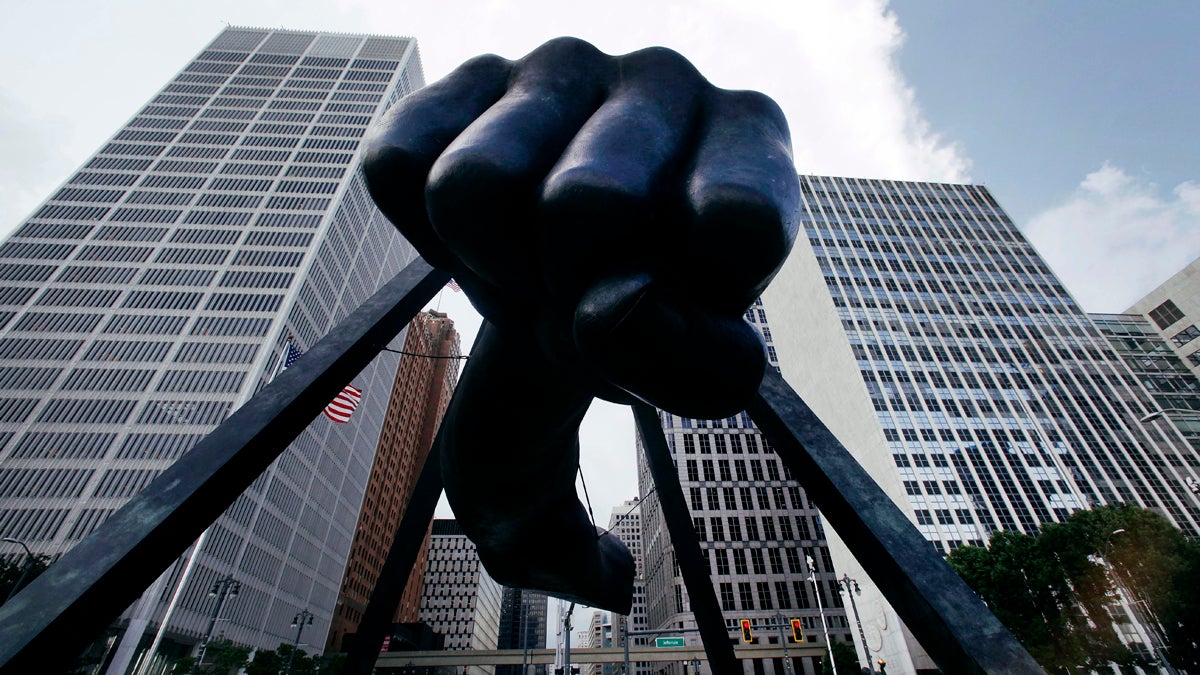  The Detroit skyline rises behind the Monument to Joe Louis, also known as 
