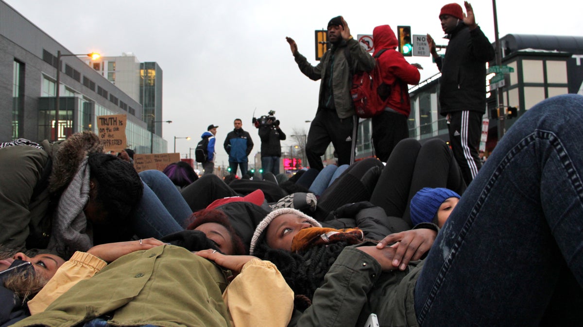  Temple students stage a die-in at Broad and Cecil B. Moore to protest police violence. (Emma Lee/WHYY) 