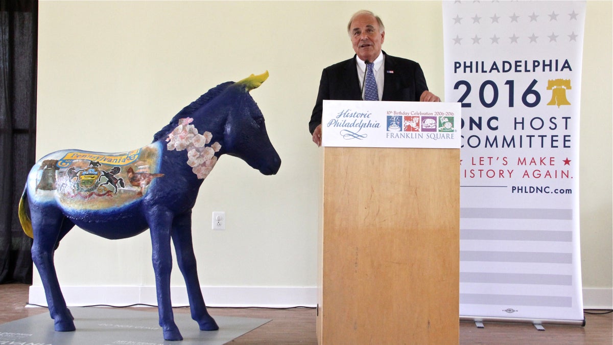 Democratic National Convention Chairman Ed Rendell presents one of 57 decorated fiberglass donkeys that will be placed around the city during the convention. (Emma Lee/WHYY)