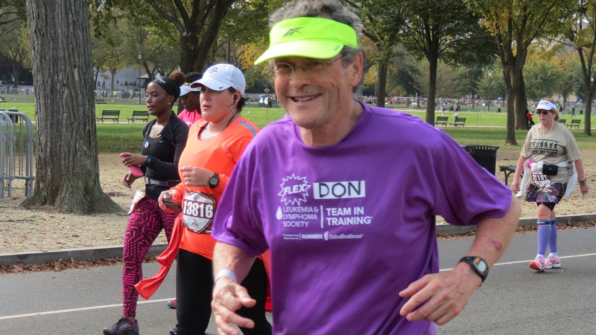 Don Wright is shown running the 2015 Marine Corps Marathon in Crystal City