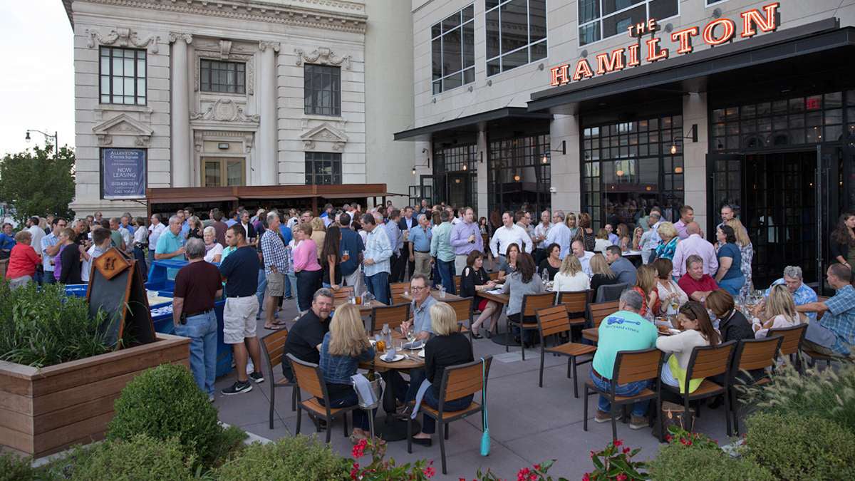  Bustling restaurants and businesses on opening night of the PPL Center in downtown Allentown, Sept. 12, 2014. (Lindsay Lazarski/WHYY)  
