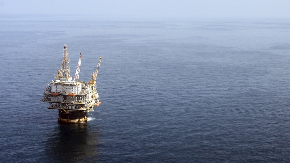 In this file photo taken Aug. 19, 2008, the Chevron Genesis Oil Rig Platform is seen in the Gulf of Mexico near New Orleans, La. (Mary Altaffer/AP Photo) 