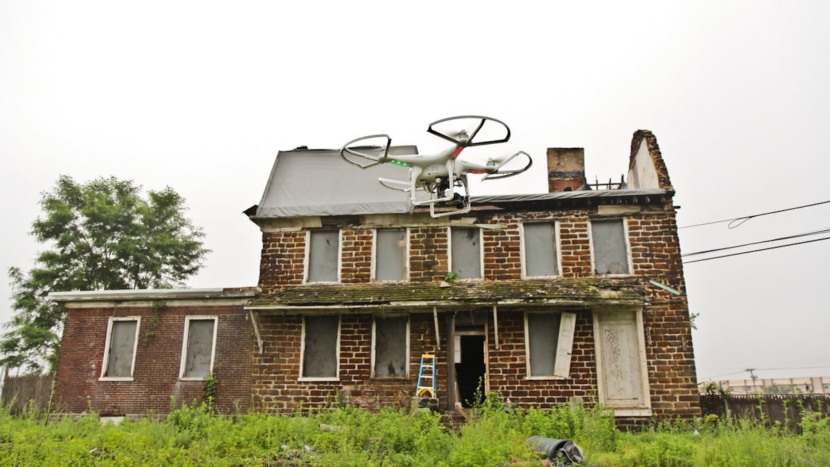  Historic Preservation Architects use drones equipped with cameras to safely view the damaged and hard to reach places of buildings during assessment. (Kimberly Paynter/WHYY) 