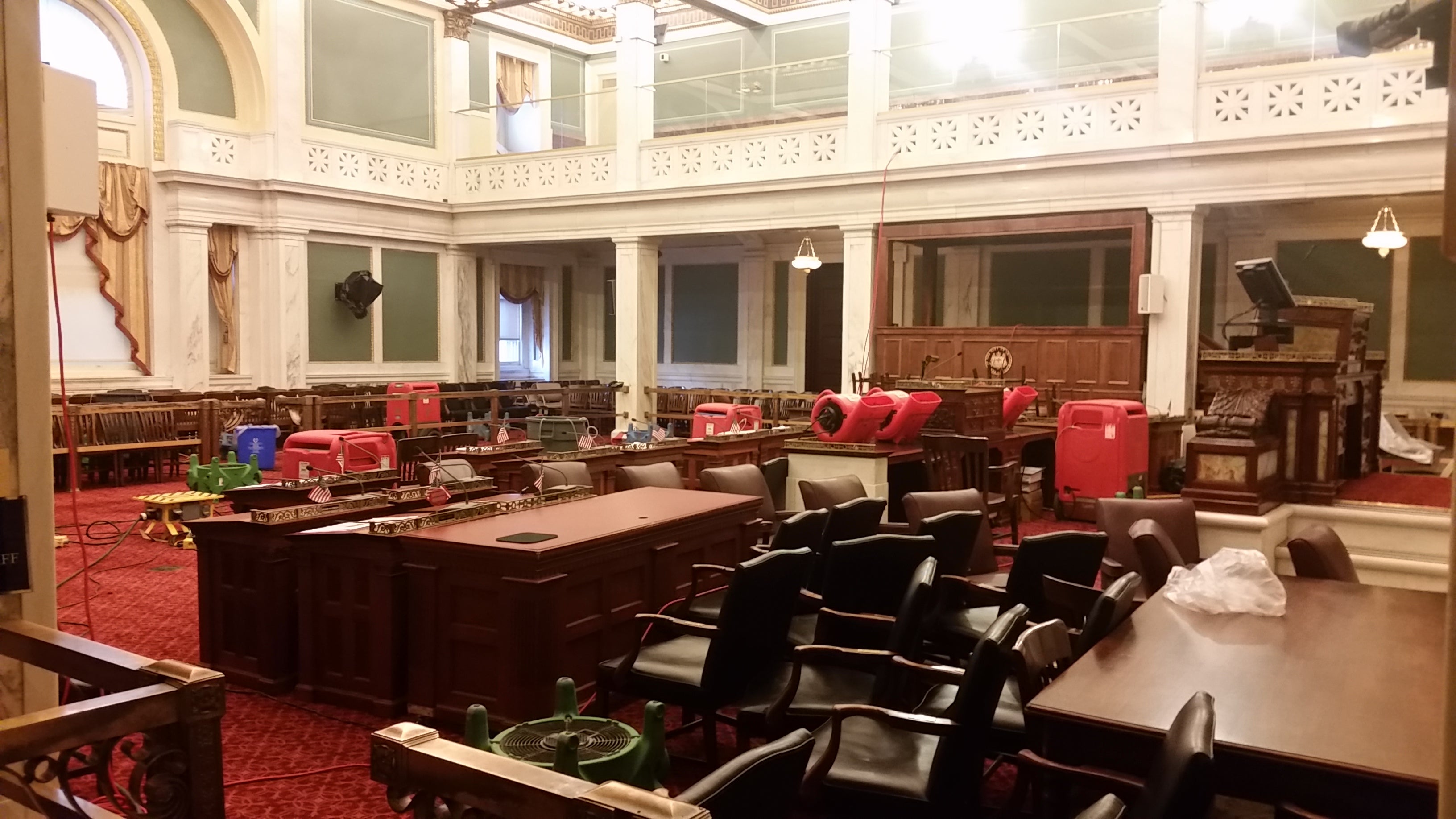  The drying-out process continues in Philadelphia City Council chambers following Tuesday's flooding. (Tom MacDonald/WHYY) 