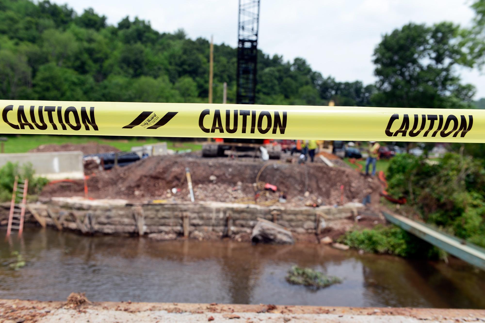  Caution tape marks the verge of a bridge replacement in Curtin Township in Centre County on Route 1002. (Kelly Tunney/WPSU) 