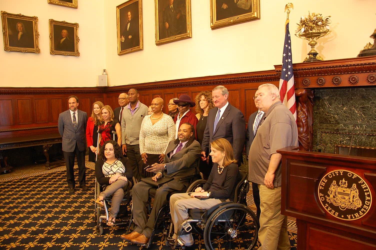 Mayor Jim Kenney and the Mayor's Commission on People with Disabilities gather at City Hall. (Tom MacDonald/WHYY)
