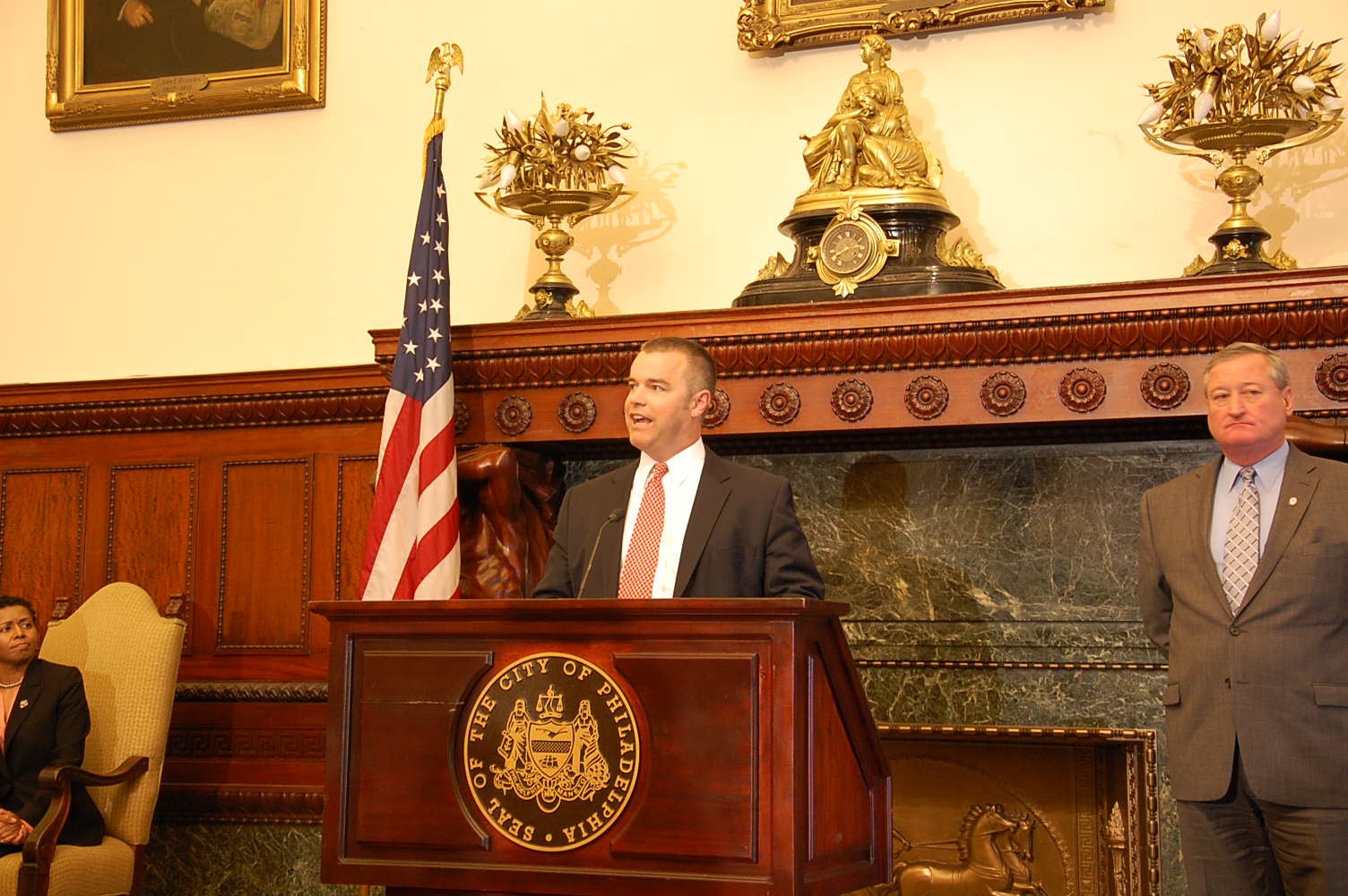 Mayor Jim Kenney (right) looks on as Adam Thiel talks about his new vision for the Philadelphia Fire Department.   (Tom MacDonald/WHYY)