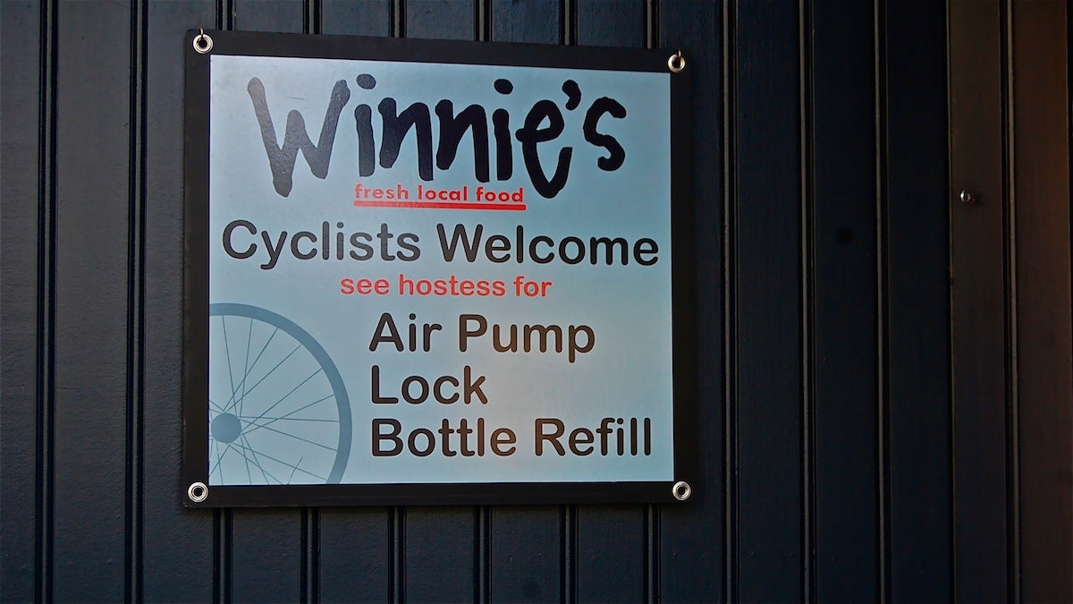  This sign welcomes bikers to Winnie's on Main Street in Manayunk. (Emily Brooks/for NewsWorks) 