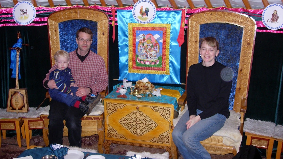  Melissa Chakars (left) with her husband, Janis, and their son Vilnis in a traditional Buryat hut. (Courtesy of Robert Quijada) 