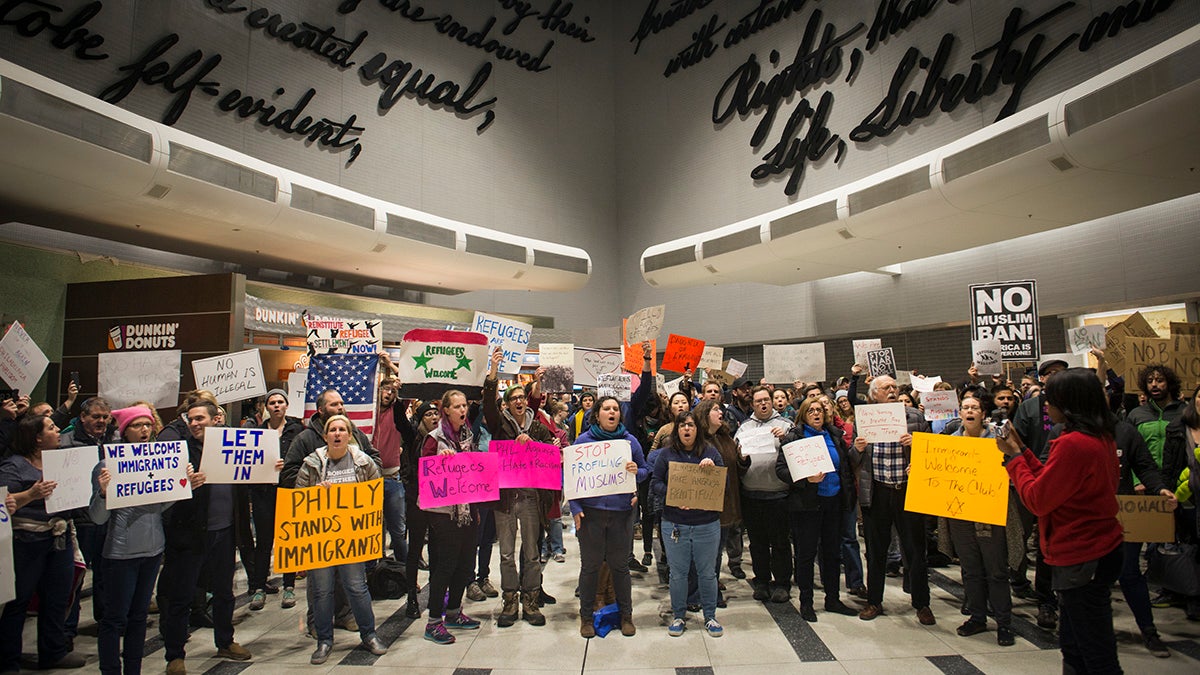 Protestors angered by President Donald Trump’s executive order that prevented refugees, visa and green card holders from entering the US chant pro immigration slogans at Philadelphia International Airport. (Branden Eastwood for NewsWorks)