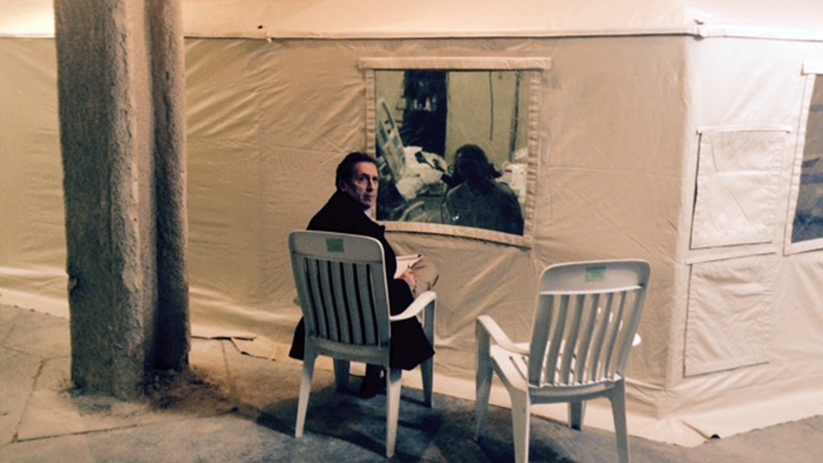  In this Sunday, Oct. 26, 2014, photo provided by attorney Steven Hyman, quarantined nurse Kaci Hickox meets with the prominent New York civil rights attorney Norman Siegel, seated, at the isolation tent at University Hospital in Newark, N.J., where Hickox was confined after flying into Newark Liberty International Airport following her work in West Africa caring for Ebola patients. Hickox, the first person forced into a mandatory quarantine in the state, was released Monday but has complained about her treatment. (AP Photo/Steven Hyman) 