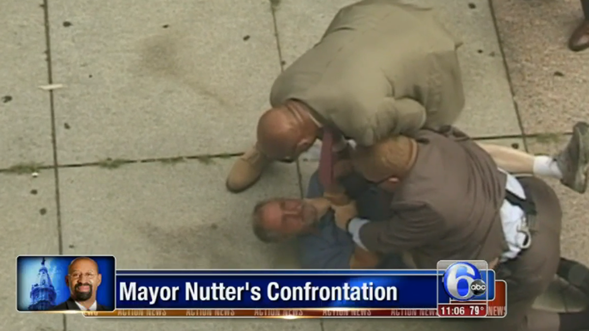  A young amateur photographer captured a confrontation between a homeless man and Philadelphia Mayor Michael Nutter's security detail in Center City. (Image via ABC6/WPVI-TV) 