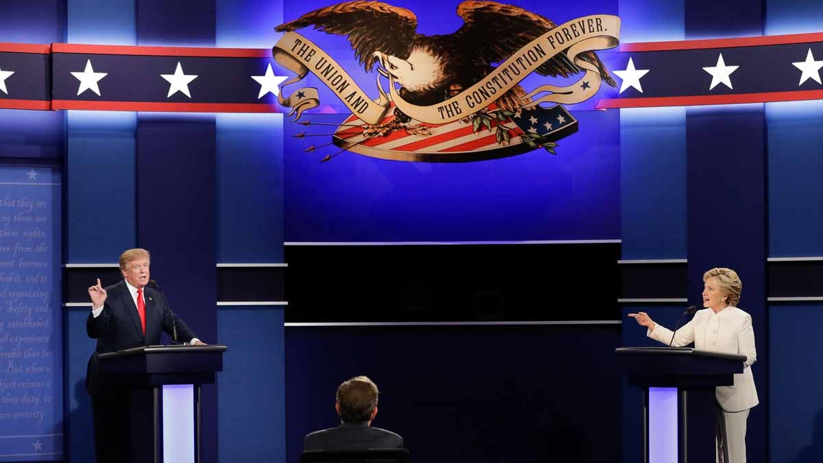 Democratic presidential nominee Hillary Clinton exchanges views Republican presidential nominee Donald Trump during the third presidential debate at UNLV in Las Vegas
