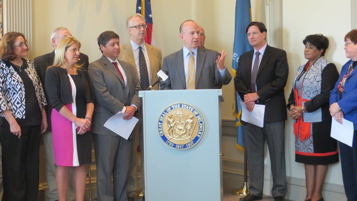  Gov. Jack Markell joins lawmakers at the bill package's unveiling (Shana O'Malley/for NewsWorks)  