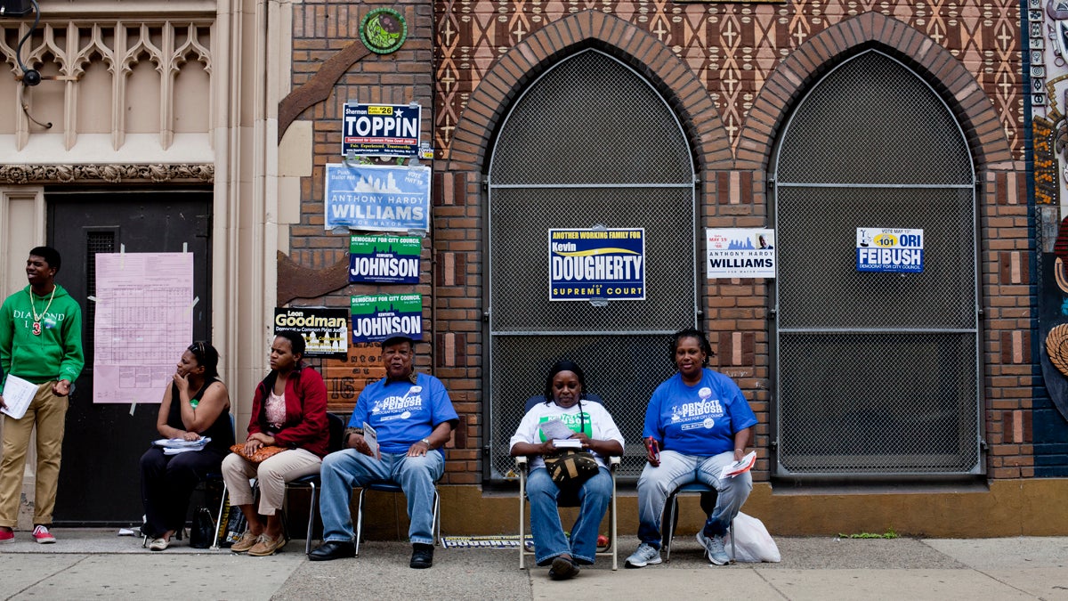 Voting at the GW Childs Elementary polling place in South Philadelphia on Primary Day 2015. (Brad Larrison/for NewsWorks)