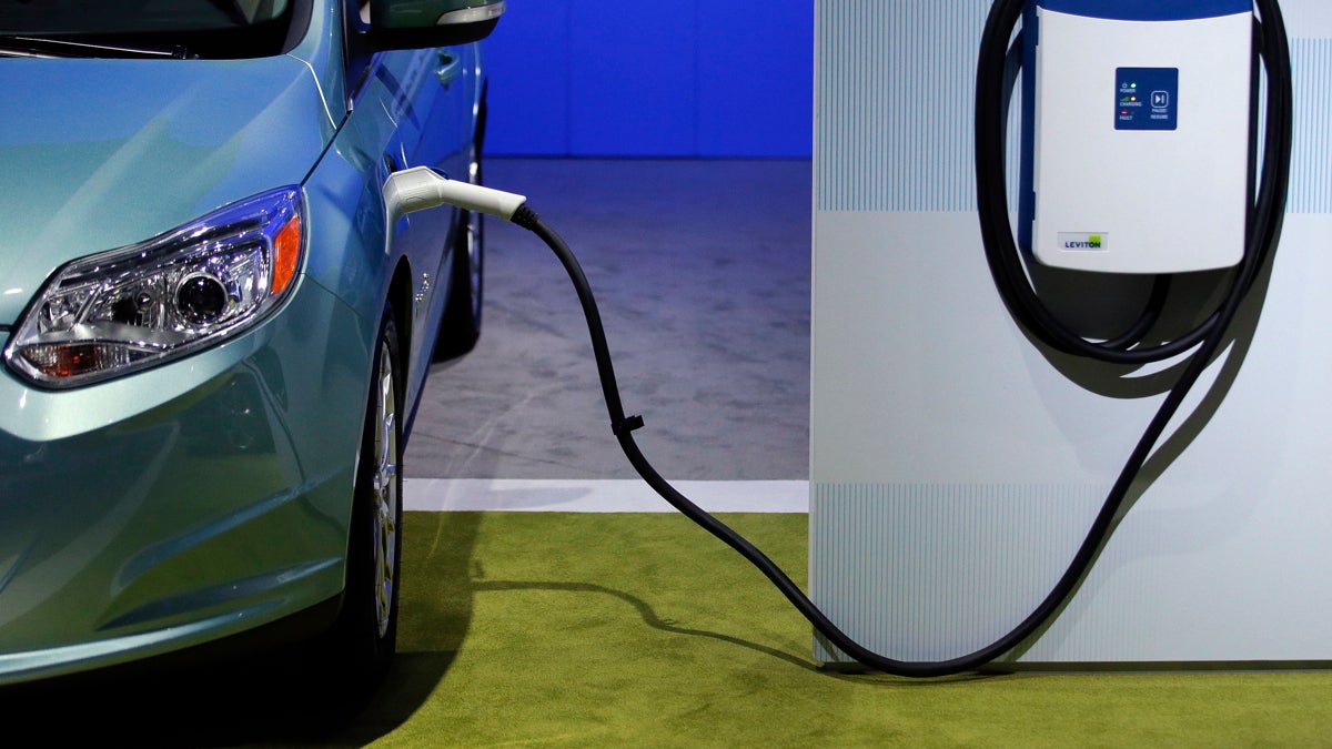 A charging station is displayed at the LA Auto Show in Los Angeles. (Jae C. Hong/Associated Press)