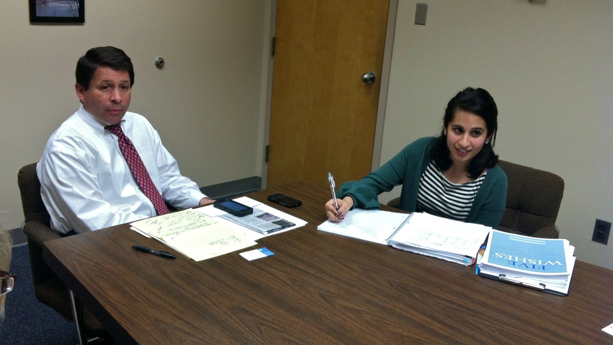  Gloucester Township Mayor David Mayer works with Wellness Coordinator Janan Dave on a campaign to encourage families in the community to have end-of-life discussions. Mayer, who lost his mother last year, brings his personal experiences to the table. (Elana Gordon/WHYY) 