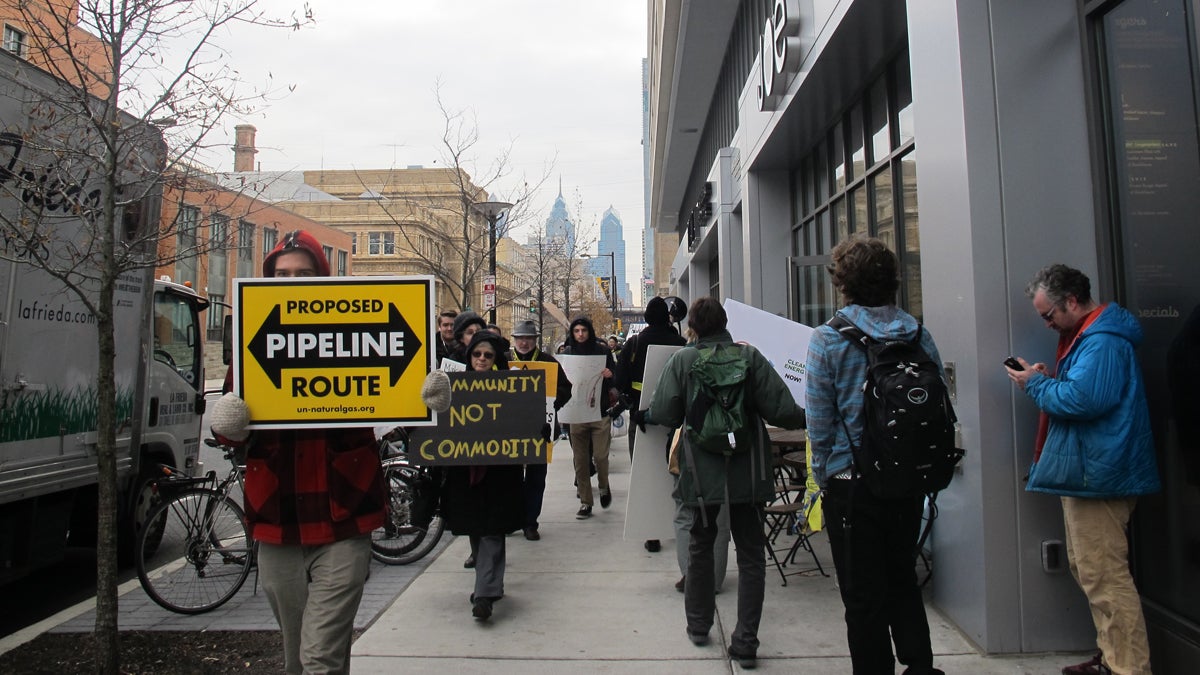  Dozens of protestors carried signs and chanted “no fracking hub” outside Drexel University’s Creese Student Center on Dec. 5, where business leaders met to discuss plans for expanding Philadelphia's role in the Marcellus Shale natural gas boom. (Katie Colaneri/StateImpact Pennsylvania) 