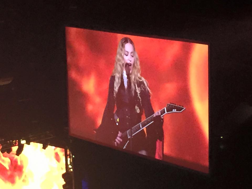  Madonna, on screen, during her Philadelphia concert (Eric Walter/WHYY) 