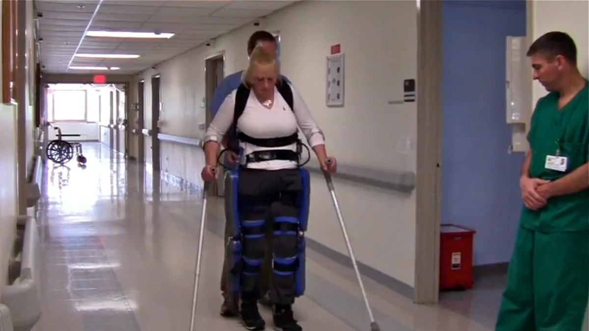  Jean Altomari learns to walk using the ReWalk at Moss Rehabilitation. (NewsWorks file photo) 