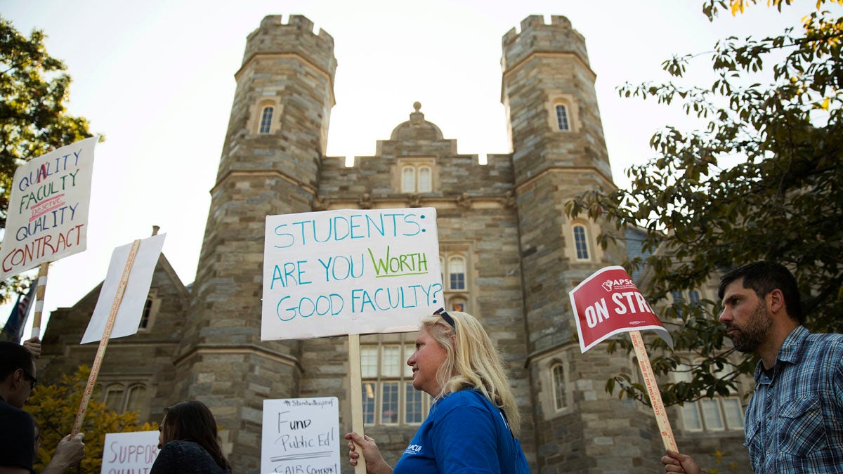  Faculty members Juliet Wunsch, center, and Jeremy Holmes, right, walk a picket line at West Chester University in West Chester, Pa., Wednesday, Oct. 19, 2016. Faculty at Pennsylvania state universities went on strike Wednesday morning after contract negotiations between the Pennsylvania State System of Higher Education and its faculty union hit an impasse. The state system and its largest union reported late Friday afternoon that they’d come to a tentative agreement. (AP Photo/Matt Rourke) 
