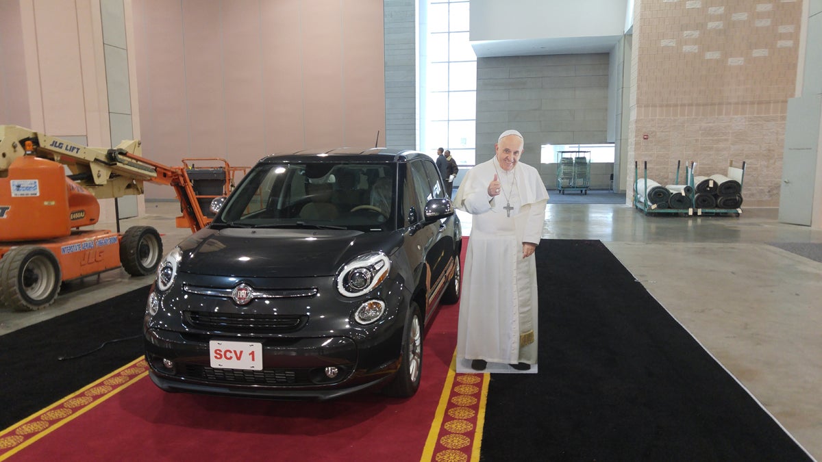  One of the Fiats that ferried Pope Francis around Washington, New York and Philadelphia in September will be up for auction at a Philadelphia Car Show benefit. (Tom MacDonald/WHYY) 