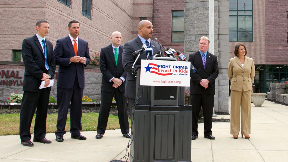  District attorneys from Delaware, Montgomery, Philadelphia, Chester, and Cumberland counties all gathered outside the state correctional facility in Chester to voice their support of expanding pre-K education to more at-risk kids in Philadelphia. (Nathaniel Hamilton/for NewsWorks) 