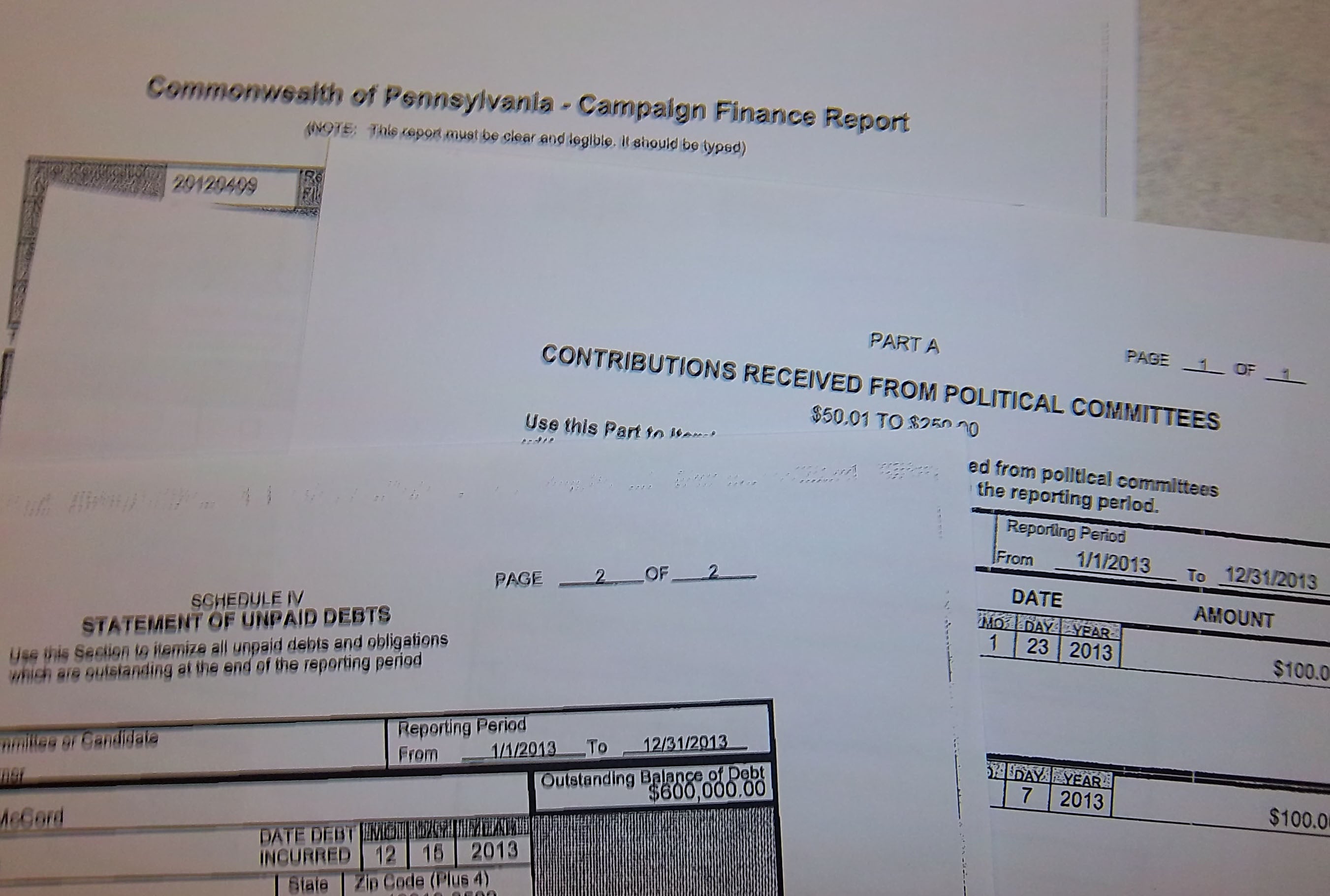  A test for the eyes - finding political donors in PA still often means poring over pages of PDF's or paper reports. (Dave Davies/WHYY) 