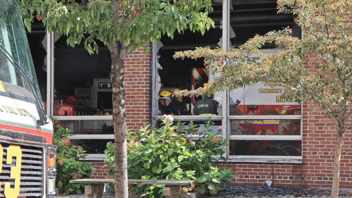  Philadelphia Firefighters quickly extinguished a blaze Friday morning inside the firehouse at Fourth and Arch streets. (Kimberly Paynter/WHYY) 
