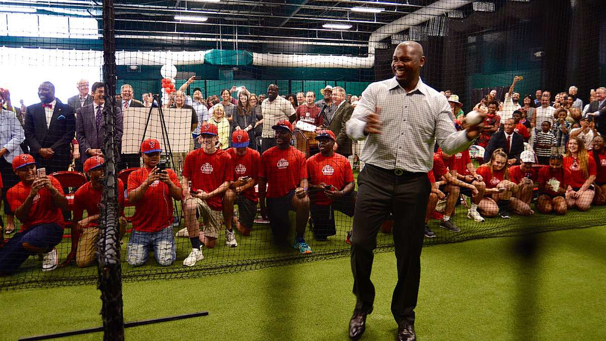 Ryan Howard throws a pitch during the unveiling of the Ryan Howard Training Center on July 20