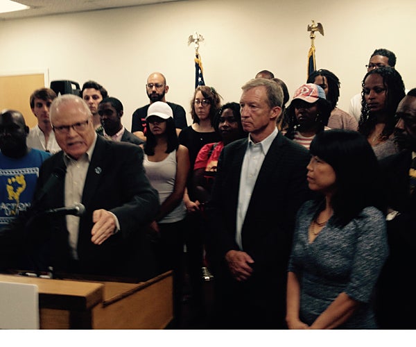 AFSCME national President Lee Saunders (left)