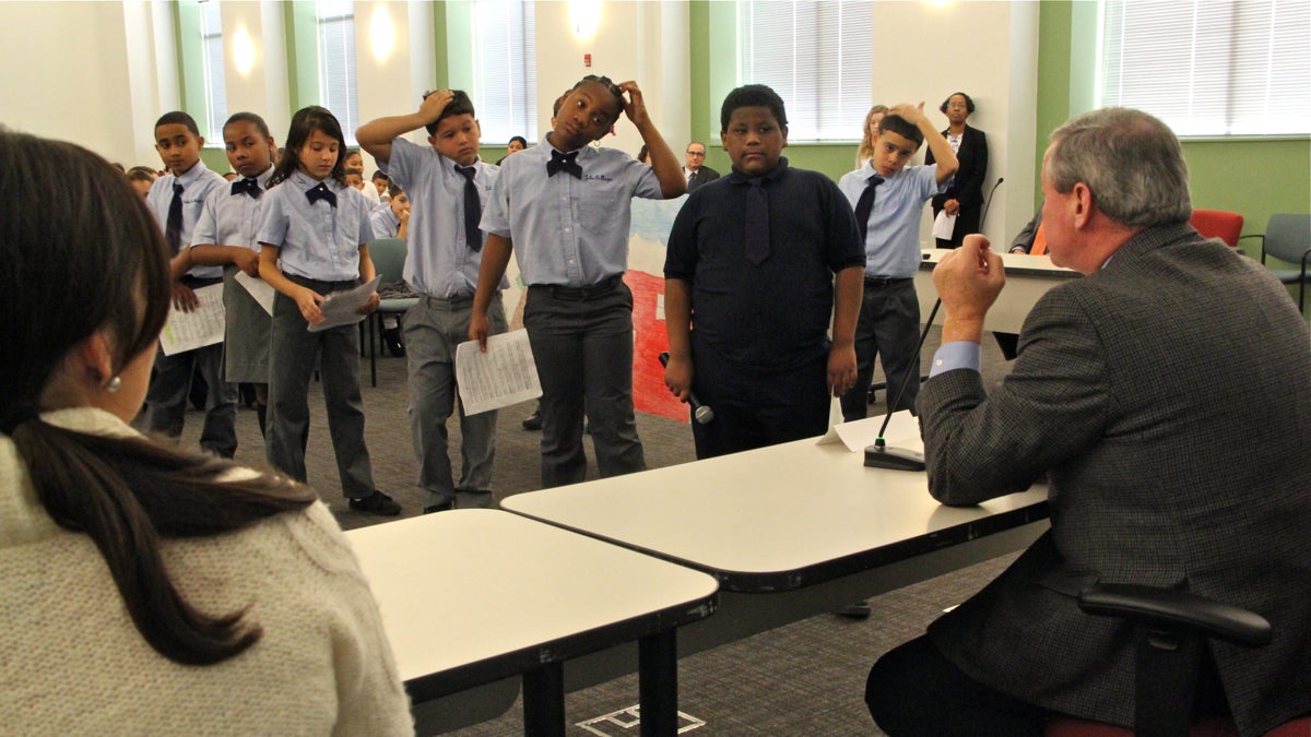 Students from Julia De Burgos elementary school listen as mayoral candidates Jim Kenney and Melissa Murray Bailey respond to their concerns. (Emma Lee/WHYY)