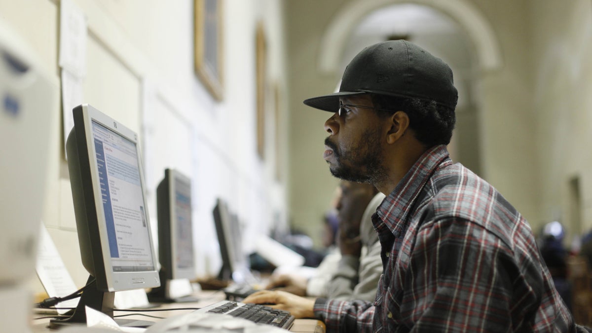 A patron is shown at the  central branch of the Free Library of Philadelphia . (AP Photo/Matt Rourke