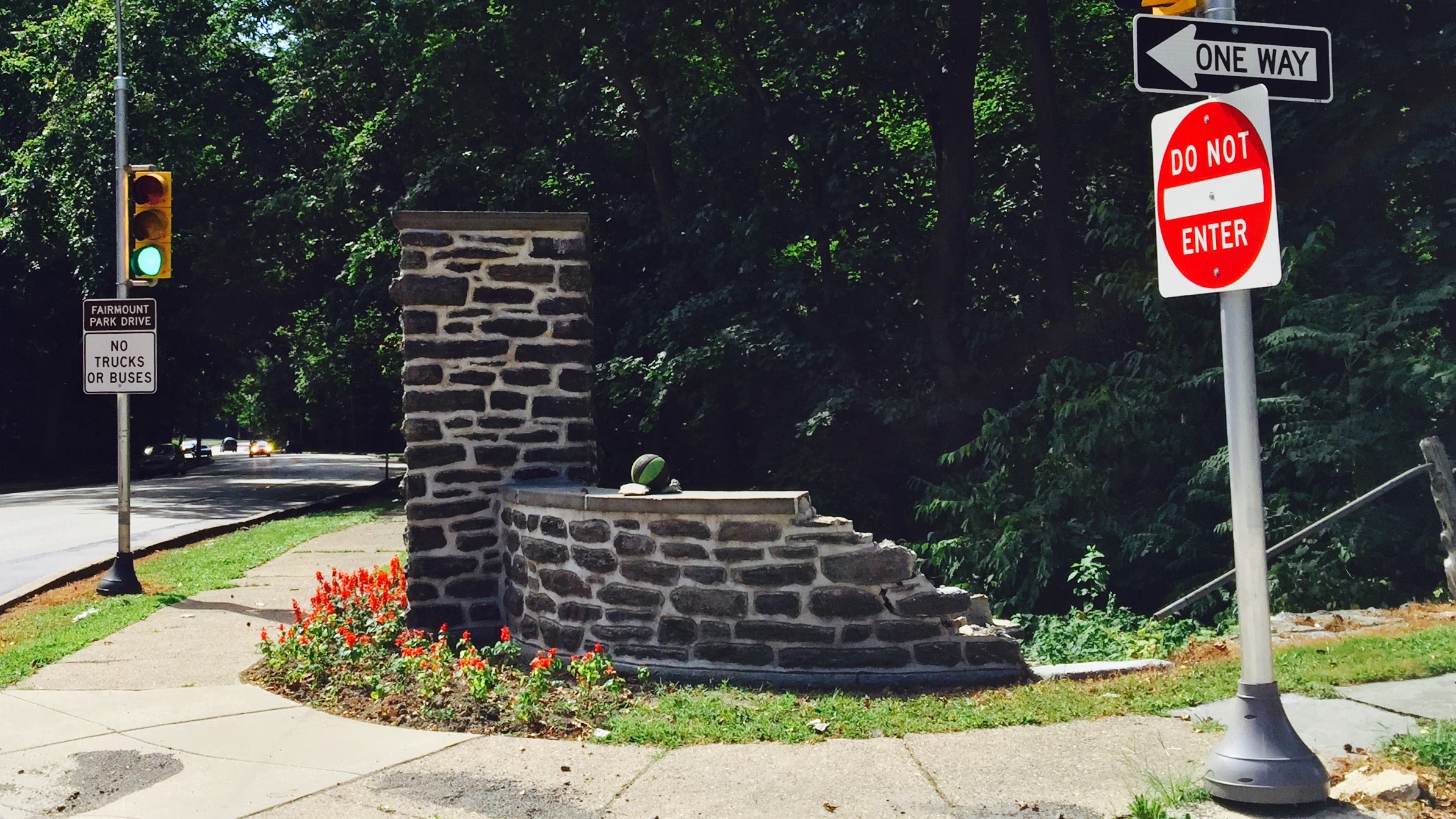  One of the remaining stone piers of the Stotesbury Gateway sustained considerable damage from a car crash months after the masonry was repointed. (Jana Shea/for Newsworks) 