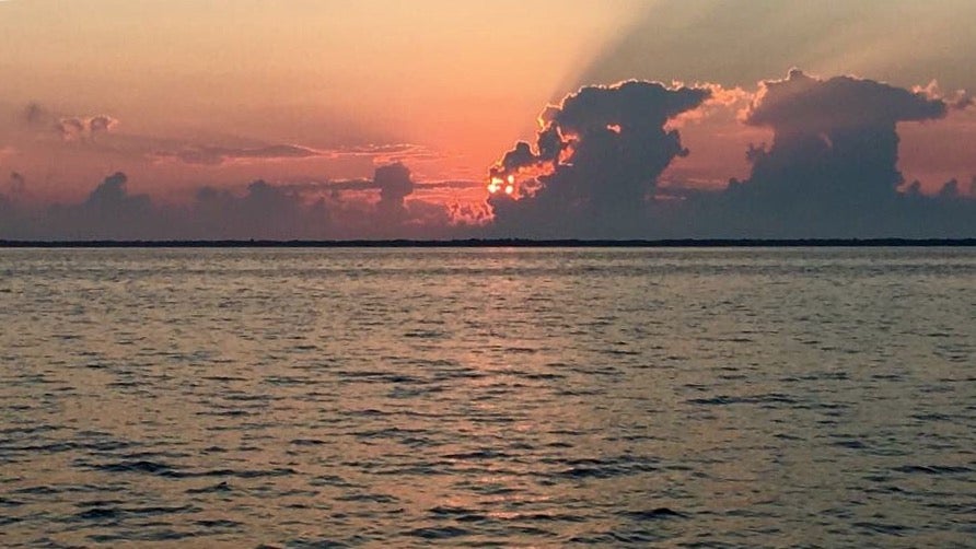 Today's sunrise over the Barnegat Bay as seen from Lanoka Harbor by JSHN contributor ‎Dana Parsons‎.