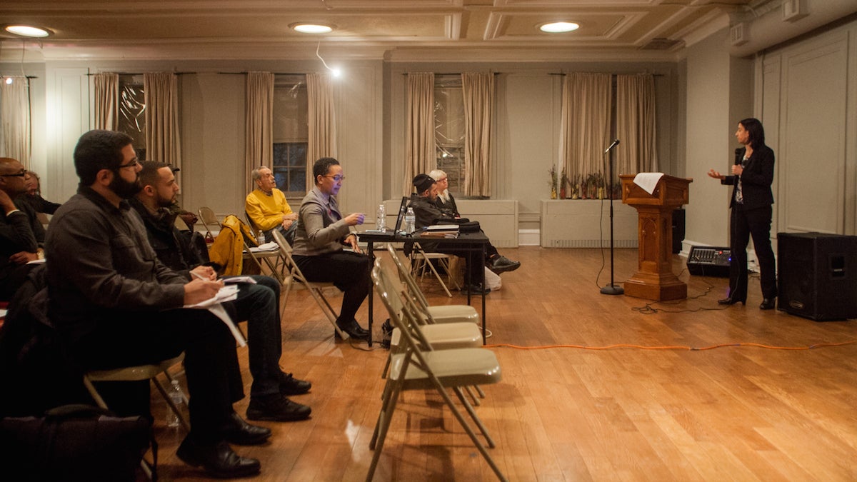 Rue Landau, Director of the city's Commission on Human Relations, spoke during a meeting in the Gayborhood Wednesday evening and informed citizens on how they can file complaints of discrimination with the city. (Brad Larrison for NewsWorks)